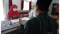 Walikota Eva Dwiana Zakat di Baznas Bandar Lampung